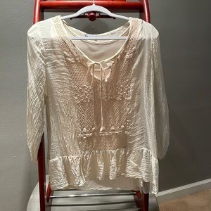 Gorgeous silk top with lovely detail! Cream color.